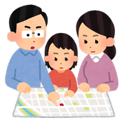 家族で避難ガイドを見ながら指定避難所を確認しているイラスト